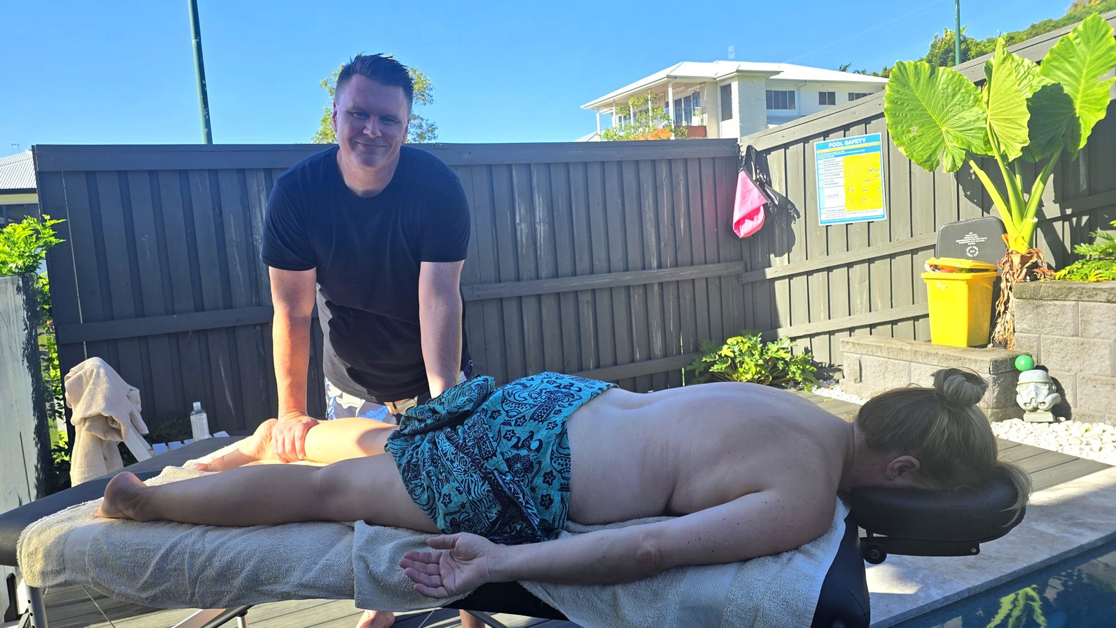 Poolside massage technique demonstration