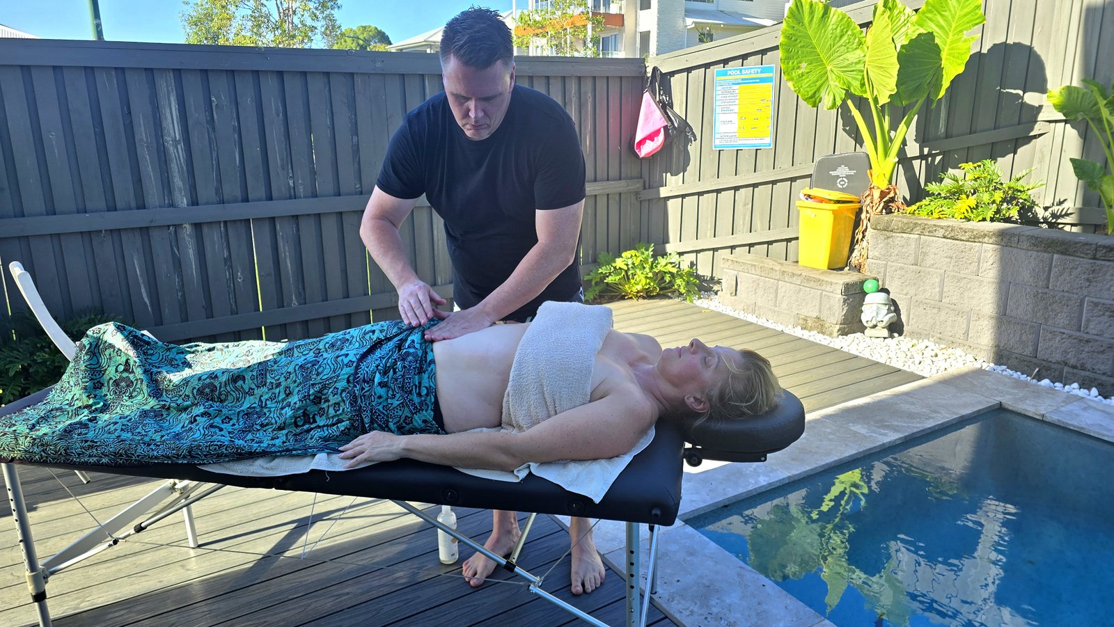 Mobile massage table setup poolside
